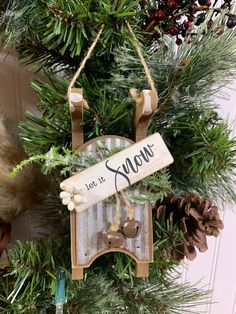 a christmas ornament hanging from a tree