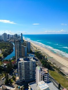 an aerial view of the beach and ocean in surfers paradise, gold coast australia