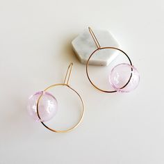 Everyday Round Glass Jewelry, Hypoallergenic Round Glass Earrings, Trendy Round Glass Jewelry, Modern Round Glass Earrings, Modern Clear Round Earrings, Trendy Clear Round Earrings, Glass Hoop Earrings Gift, Single Round Clear Earring, Modern Pink Hoop Earrings