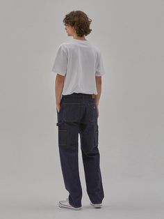 These are trendy workwear-inspired carpenter denim pants from Cork denim collaboration collection. It's cut for long and wide fit from comfortable stretch denim.- Zip and button fastening- Two front slash pockets- Four back pockets- Hammer loop- Logo leather patch at back- Wide fit Trendy Workwear, Loop Logo, Leather Patches, Denim Pants, Stretch Denim, Cork, Work Wear, ? Logo, Pants