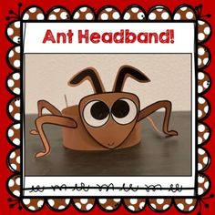 an ant headband made out of paper with googly eyes