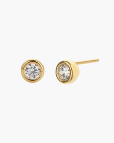 Elevate your style with the Margot Stud Earring, featuring a sparkling, circular accent encased in a round gold frame. This elegant stud design offers a sophisticated touch, perfect for enhancing any outfit with a classic yet contemporary flair. 18k gold over sterling silver Cubic Zirconia Our gold covering on silver is a thick layer of 18k solid gold on sterling silver meaning it will last longer. You get the look and feel of gold jewelry at a fraction of the price. Classic Gold Diamond Earrings, Tarnish Resistant, Modern Gold Earrings With Prong Setting, Gold Earrings With Bezel Setting For Anniversary, Formal Gold Bezel Set Earrings, Classic Tarnish Resistant Round Cut Earrings, Modern Round Halo Design Earrings, Gold Round Brilliant Cut Earrings, Gold Brilliant Cut Earrings, Classic Gold Plated Round Diamond Earrings