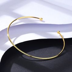 This Thin Cuff Adjustable Bracelet is crafted with 14K gold plated for a sophisticated and durable finish. Its adjustability allows for a personalized fit and style. Enjoy the luxe look of 14K gold without the high price tag. Details: This beautiful and stylish Thin Cuff Adjustable Bracelet is 14K gold plated and perfect for everyday wear. 14K Gold Plated Thin Cuff Bracelet Adjustable Approximate Dimensions: Widest Point: 2.4" Cuff Bracelet Gold, Gold Bracelet Cuff, Bracelet Gold, Gold Plated Silver, Price Tag, Adjustable Bracelet, Cuff Bracelet, Everyday Wear, Gold Plate