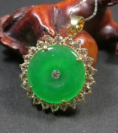 Genuine Yellow Gold Plate White Zircon Green Jade Circle Donut Pendant Necklace with 18 inches Chain It include Yellow Gold plate Chain Include Jewelry Pouch ** Free ** Include White Gold Plate Chain  ** Free ** Jade 100% Real China Northern Jade Jade Enhance by Heat Size 31mm X 28mm X 7mm  Color See Photo ** Icy Green Color ** Picture Due to our low photography level, the real item is much better then the picture Donut Necklace, Jade Necklace Pendant, Jade Charm, Donut Pendant, Sterling Silver Promise Rings, Heart Necklace Diamond, Egyptian Jewelry, Jewelry Website, Necklace Diamond