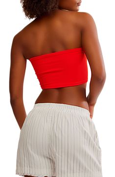 Love to layer—or dare to bare—in this sleek and modern bandeau bra top covered in fine ribbing that eases the body-hugging fit. 8 1/2" center front length (size Medium/Large) Strapless 92% nylon, 8% spandex Machine wash, dry flat Made in the USA Red Bandeau Tube Top With Built-in Bra, Solid Fitted Cropped Tube Top, Fitted Strapless Bra-friendly Tube Top, Strapless Seamless Crop Top, Seamless Strapless Crop Top, Fitted Cropped Tube Top, Red Strapless Fitted Crop Top, Red Fitted Strapless Crop Top, Fitted Strapless Halter Top