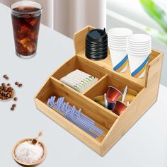 a wooden tray filled with lots of food and drinks