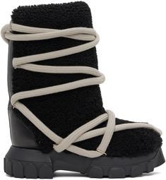 Mid-calf shearling boots in black. · Lace-up closure · Grained leather trim at heel · Canvas and grained calfskin lining · Platform midsole · Treaded rubber outsole · Platform: H2.25 in Supplier color: Black/Black Moon Boots Outfit, Boot Fashion, Moon Boot, Shearling Boots, Mens Fashion Classy, Moon Boots, Boots Outfit, Rick Owens, Mary Jane Sneaker