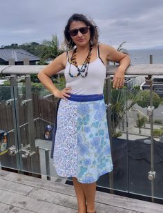 "THIS EXACT one is sold, but i can do a very similar colourway, with some blue floral. Beautifully hand made each one unique. *Created from 6 colour co-ordinating panels,  *upcycled from skirts, pants, duvets and tablecloths, mostly cotton mix *Wrap skirt will fit size 8-18, *waistband is shaped to fit properly  *buttonhole at center back to poke ties through and hold snug.  *You can wrap so that either end shows in the front, allowing for 2 different looks. * Length is aprox 57cm/22\" *Machine Cotton Hippie Wrap Skirt For The Beach, Hippie Cotton Wrap Skirt For Beach, Bohemian Skirt With Floral Patchwork For The Beach, Bohemian Floral Patchwork Skirt For Beach, Bohemian Beach Skirt With Floral Patchwork, Summer Patchwork Wrap Skirt, Blue Floral Print Skirt For Festivals, Blue Patchwork Maxi Skirt For Summer, Bohemian Floral Print Flowy Wrap Skirt