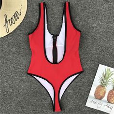 Fabric: PolyesterSize: S, M, LColor: RedSleeves: SleevelessWaistline: High RisePattern Type: Red, Zipper, Low Back, High CutStyle: Hot, Beach, Vacation SwimsuitsPackage Contents: 1* Swimsuit without Accessories Casual Beach Swimwear With Zipper Closure, Casual Summer Swimwear With Zipper Closure, Vacation Swimsuit, Backless One Piece Swimsuit, High Cut Swimsuit, Hip Clothes, Plunging One Piece Swimsuit, Swimsuit Sale, Red Swimsuit