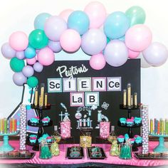 a science lab themed birthday party with balloons