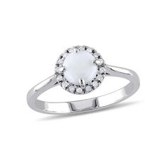 This simple yet trendy engagement ring is crafted in sterling silver and features an opal center stone.Around the opal sits a halo of lustrous diamonds.This ring is perfect for a woman who seeks simplicity and elegance. 1/2 Carat (ctw) Opal Halo Ring in Sterling Silver Size: 7.5.  Color: White.  Gender: female.  Age Group: adult. Trendy Engagement Rings, Turquoise Ring Engagement, Halo Ring Setting, Heart Wedding Rings, Antique Silver Rings, Heart Gemstone, Silver Jewelry Rings, Turquoise Rings, Blue Sapphire Rings