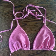 This Has Never Been Worn. I Forget The Actual Color Name. Never Bought The Bottoms So I Just Never Wore It. Spring Triangle Top Swimwear With Stretch, Fitted Seamless Halter Top With Tie-side Bottom, Summer T-back Tops For The Beach, Bra Friendly Triangle Top For Sunbathing, Trendy Pink Seamless Swimwear, Spring Triangle Top For Sunbathing, Pink T-back Halter Top For Poolside, Pink T-back Halter Top For Sunbathing, Pink Summer Halter Top With T-back