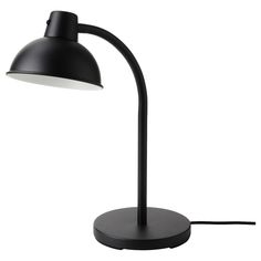 a black lamp with a white light on it