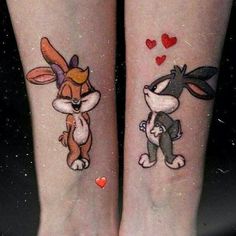 two tattoos on the legs of people with bunny and rabbit ears painted on their feet