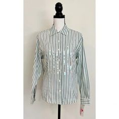 "Vintage 1990s | Deadstock Sequin & Striped Button-Down Blouse.  Mint green/turquoise and white, vertically striped button-down. Collared top, new with tags. The brand is \"Lizwear\" which is part of \"Liz Claiborne.\" 100% cotton.  Vintage size small, but please refer to measurements: 38\" chest, 33\" waist, 17\" shoulders, 22.5\" sleeves, 26.5\" length." Green Vertical Stripes Shirt For Spring, Spring Green Shirt With Vertical Stripes, Striped Cotton Blouse With Buttons, Green Vertical Stripes Button-up Shirt, Fitted Vertical Stripe Button-up Tops, Fitted Button-up Tops With Vertical Stripes, Fitted Vertical Stripe Button-up Shirt, Fitted Button-up Shirt With Vertical Stripes, Green Fitted Button-up Shirt