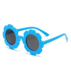 Blue sunflower kids sunglasses for your little diva. These sunglasses are perfect for kids ages 3 to 9 years. Playful Blue Sunglasses For Party, Playful Blue Party Sunglasses, Cute Blue Summer Sunglasses, Cute Blue Sunglasses For Summer, Fun Blue Polarized Sunglasses, Playful Blue Sunglasses For Spring, Light Blue Sunglasses With Uv Protection For Beach, Playful Blue Tinted Sunglasses, Playful Blue Sunglasses With Uv Protection