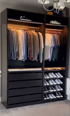 an organized closet with clothes and shoes