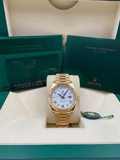 Rolex Rose Gold Day-Date 40 228235 Unworn 2020 Rolex Day-Date 40mm White Roman Dial Yellow Gold Bracelet 228238 Pre-Owned 2023 This is a pre-owned watch in overall very good condition. The watch comes with everything seen in the first photo including the original box and papers. There are some light marks on the bezel, bracelet, case, case back, and clasp from wear. None of the marks are deep in nature. The crystal appears to be free of any major imperfections warranting replacement. We did not polish the watch but, it is possible that the watch was previously, professionally, touched up. The bracelet comes fully linked with all of the links that come standard on the model already on the bracelet. The bracelet will fit an approximately 7.5" wrist size. If additional links are needed, they Rolex Rose Gold, Bezel Bracelet, Rolex Day Date, Yellow Gold Bracelet, In Nature, Michael Kors Watch, Gold Watch, Rolex Watches, Accessories Watches