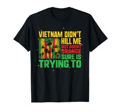 a black t - shirt with the words vietnam don't kill, but there is orange