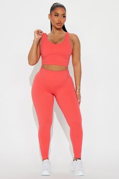 Available In Taupe And Orange. Sports Bra Sleeveless Scoop Neck Padded Under Bust Piping Ribbed Knit Back Low Impact 75% Nylon 25% Spandex Imported | Angela Sports Bra in Orange size XS by Fashion Nova Orange Seamless Sports Bra For Workout, Stretch Orange Sports Bra, Fitted Orange Functional Sports Bra, Orange Athleisure Sports Bra Medium Support, Orange Summer Sports Bra, Search By Photo, Orange Fashion, Swim Bottoms, Jeans Jumpsuit