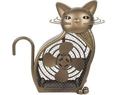 a metal cat sitting on top of a fan