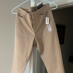 Size 6. Never Worn Great Condition. Tan Slacks/Pants Non-stretch Workwear Chinos, Spring Non-stretch Chinos For Workwear, Non-stretch Spring Chinos For Workwear, Spring Workwear Non-stretch Chinos, High Waist Fitted Chinos For Workwear, High-waisted Fitted Chinos For Work, Fitted High Waist Chinos For Work, Slacks Pants, Slack Pants