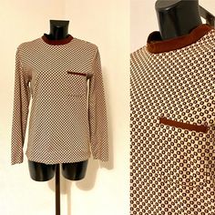 "Vintage Men's Sweater Shirt Retro Pullover Top Men's Polo Shirt Round Neck Shirt Preppy Beige Brown Polka Dot Boho Bohemian Shirt Size 50/M ♥ Men's Round Neck Shirt ♥ Pocket on chest Condition: Vintage Good: Very Good condition Tag: Schiesser men-fit Materials: 100% Cotton Size: On Tag 50/ F 3/ CH7/ US M Measurements: Length : 69cm = 27,2\" Width: 50cm = 19,7'' Sleeves: 62cm = 24,5'' Shoulder to Shoulder: 40cm = 15,7\" **Measurements are taken with the garment lying flat. (Some sizes then doubled - Bust, Waist, Hips). Be sure to leave room for movement and comfort** Additional Notes: Please note that due to the nature of vintage clothing, ALL ITEMS ARE SOLD AS-IS; with no returns or exchanges, regardless of fit or condition. We try our best to give as much measurements as possible, note e Brown Long Sleeve Top With Graphic Print, Vintage Crew Neck Patterned Tops, Vintage Patterned Crew Neck Tops, Retro Patterned Long Sleeve Top, Retro Long Sleeve Patterned Top, Vintage Patterned Long Sleeve Tops, Vintage Long Sleeve Patterned Tops, Cleveland Browns Shirts, Plain Tee Shirts