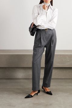 Find TOTÊME Pleated Woolblend Straightleg Pants on Editorialist. Straight-leg pants wool-blend pleated two side slant pockets two back welt pockets belt loops high-rise cut concealed hook, button and zip fastening at front mid-weight, non-stretchy fabric machine wash or dry clean imported TOTEME's pants will effortlessly take you from business meetings to post-work drinks. Tailored from a wool-blend, they have a high-rise waist and pleated straight legs. The gray mélange is eternally classic.