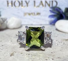 Don't miss this opportunity to own this beautiful gemstone ring crafted in 14k gold filled => Gemstone Type - Peridot, Clear Quartz => Gemstone Cut - Faceted => Gemstone Size - 8*10 mm, 3*5 mm => Total Number of Gemstones - 3 => Metal Type - 14k Gold Filled (Tarnish Resistant And Nickel Free) - also available in 925 sterling silver * Please contact me for pricing on a sizes larger than 11 * ~ Feel free to ask me about custom made designs. ❏ Replacements and custom orders : ✪ 925 s Peridot Three Stone Jewelry As Gift, Three Stone Peridot Jewelry As Gift, Rectangular Three Stone Jewelry Gift, Rectangular Three Stone Jewelry As A Gift, Three Stone Rectangular Jewelry Gift, Square Cut May Birthstone Rings For Gift, Green Rectangular Stone Ring, Radiant Cut Three Stone Ring As A Gift, Three Stone Radiant Cut Ring For Gift