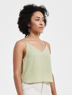 This premium v-neck satin crop top is features double layered chest piece for added security.  It includes a low back cut with adjustable straps.  Feel elegant and comfort all in this one simple piece. Best paired with high-waisted pants, shorts, or skirt for a refined twist to your daily outfit. Made with SUPESU Satin. Available in 3 delightful colors. Brazilian Model is 5'6, 34B, waist 27.2", wearing size 1. Asian Model is 5'4, 32B, waist 24.8", wearing size P1.  P2: US Size 5/0 - 4/0 P1: US S Brazilian Model, Satin Crop Top, Chest Piece, Satin Top, Low Back, High Waisted Pants, Daily Outfits, Camisole Top, Adjustable Straps