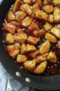 some food is cooking in a pan on the stove