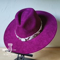 If you’re looking for the perfect accessory to complement your favorite boho style, look no further. The Boho-Style Western Felt Hat w/ Embossed Leather Hat Band by The Jewelry Junkie is absolutely everything that you need. Not only is it easy to incorporate into any and all outfits, but the genuine leather of the band immediately elevates whatever it is you’re wearing. Match your one-of-a-kind hat with any one of the matching accessories that we have for a completely gorgeous look. One Size Hat Purple Adjustable Flat Brim Felt Hat, Adjustable Flat Brim Purple Felt Hat, Adjustable Purple Felt Hat With Flat Brim, Adjustable Western Purple Hat, Bohemian Wide Brim Felt Hat For Ranch, Bohemian Brimmed Felt Hat For Western-themed Events, Bohemian Fedora Felt Hat For Rodeo, Bohemian Brimmed Felt Hat For Ranch, Bohemian Curved Brim Felt Hat For Ranch