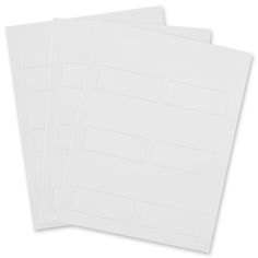 three sheets of white paper stacked on top of each other