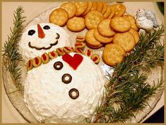 a snowman made out of rice krispy kreme cookies and crackers