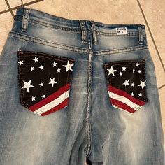 Cotton/Spandex Blend American Flag On Back Pockets Stripes Down Front Pockets Trendy Cotton Jeans For 4th Of July, Patriotic Denim Bottoms For Spring, Patriotic Spring Denim Bottoms, Casual Bottoms For 4th Of July, Casual Cotton Bottoms With American Flag, Casual American Flag Cotton Bottoms, Painted Jean Pockets, Jean Diy, Senior Jeans