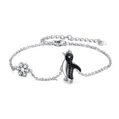 PRICES MAY VARY. 💖 Design: A cute animal bracelet from the penguin collection.Made with 925 sterling silver plus with AAA+ black cubic zirconia,classical, cute and fashion.It's fit any occasion. 💖 Material: 925 sterling silver penguin jewelry,hypoallergenic, tarnish resistant,nickel-free,lead-free,cadmium-free,suitable for long-term wear,not contain any allergic element. 💖 Size: Penguin bracelet length:7+2 inch adjustable extension chain.Packaging: 1x penguin jewelry; 1 x polishing cloth and Snowflake Gifts, Penguin Bracelet, Sloth Jewelry, Penguin Jewelry, Snowflake Bracelet, Bracelet Cute, Animal Bracelet, Sloth Gift, The Penguin