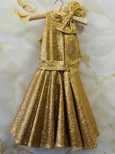 Amazing unique sequins cocktail dress in gold color. Dress is made  from high quality sequins fabric and decorated with  bow.           Zipper back. Can be made in any size and color. Gold Color Dress, Gold Sparkly Dress, Gold Dresses, Sequins Fabric, Gold Girl, Sequin Cocktail Dress, Sparkly Dress, Color Dress, Gold Sequins