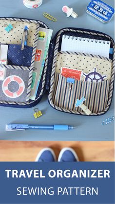 an open suitcase sitting on top of a table next to a pair of blue shoes