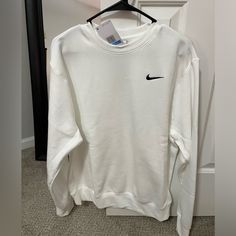 Men’s White Nike Crewneck Size Medium. Never Worn And Still Has Tag On It! Nike White Sweater For Winter, Nike White Sweater For Fall, White Nike Sweater For Winter, Nike White Crew Neck Sweatshirt, White Nike Crew Neck Sweatshirt, Nike Casual Outerwear With Crew Neck, White Nike Crewneck, Nike Phoenix Fleece, Nike Women Sweatshirt