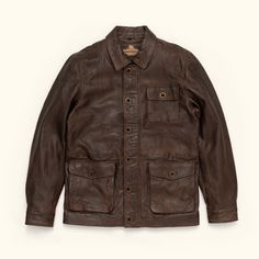 Inspired by the old west ranchers who made their mark at the base of the Bighorns… the Sheridan Barn Coat delivers enduring quality worthy of the pioneers of the past, tailored with a modern fit for the present. Outfitted with 100% full-grain lambskin leather, the Sheridan is secured by a top-to-bottom zipper concealed beneath distressed antique brass buttons, shielding an easy-clean lining that offers ample comfort and utility from sunup to sundown. Twin button-flap pockets at the side and one Classic Fall Outerwear For Rodeo, Rugged Outerwear With Double-needle Stitching, Rugged Long Sleeve Outerwear With Double-needle Stitching, Fitted Western Outerwear For Outdoor, Rugged Unstructured Outerwear For Work, Unstructured Rugged Outerwear For Work, Rugged Fitted Leather Jacket With Pockets, Vintage Fall Sport Coat With Double-needle Stitching, Vintage Sport Coat With Double-needle Stitching For Fall