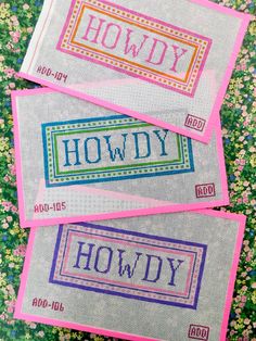 three cross stitch name tags with the words howdy and hodgy on them