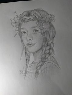 a pencil drawing of a girl with flowers in her hair