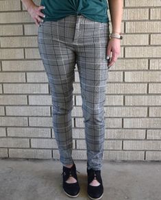 These plaid pants are your new go-to pair! They're charming and cute, without being too in your face. Great for working Moms, or on a day you want to be just a little bit dressier than the standard sweatpants! These pants will make your 🍑 your favorite asset! This black and white checkered pattern is a great new alternative to the buffalo plaid trend. Wear these with a monochromatic top, or spice it up and add color, you can't go wrong! Featuring a faux front pocket, double button front, and a Plaid Tapered Leg Pants For Fall, Trendy Non-stretch Plaid Bottoms, Plaid Tapered Leg Bottoms For Fall, Tapered Leg Plaid Bottoms For Fall, Casual Plaid Bottoms For Fall, Plaid Long Pants For Fall, Plaid Cotton Bottoms For Business Casual, Business Casual Plaid Cotton Bottoms, Trendy Plaid Ankle-length Bottoms