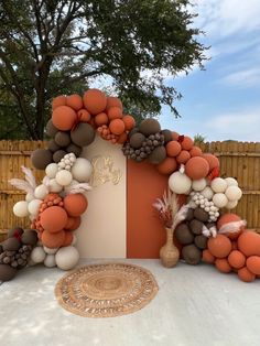 an arch made out of balloons and other decorations