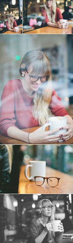 two women are sitting at a table and one is looking at her phone