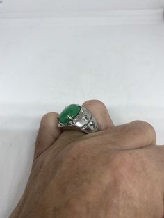 Vintage Lucky Green Nephrite Jade ring Large green nephrite jade Ornate German Silver Vintage ring, does not tarnish, NOT sterling Sizes 7 My jeweler can custom re size for a $10-$20 fee All rings are shipped free in the US in a nice gift box. Check out our over a THOUSAND great reviews Engraving is $4 per letter and is not always perfect depending on the piece. It can take a few days if the jeweler is busy. This is payable to Paypal Judithsltd@gmail.com Green Signet Ring With Oval Cabochon Gemstone, Green Oval Cabochon Gemstone Signet Ring, Green Oval Cabochon Signet Ring, Green Oval Cabochon Emerald Ring Collectible, Polished Chrysoprase Ring, Untreated Oval Green Emerald Ring, Oval Untreated Green Emerald Ring, Collectible Jade Gemstone Rings, Untreated Green Oval Rings