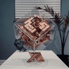 a model of a clock on top of a table