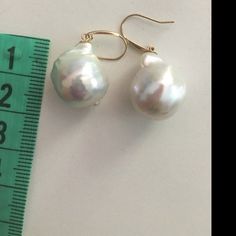 tkatova added a photo of their purchase Handmade Baroque Pearl Earrings In Pear Shape, Handmade Baroque Pearl Pear-shaped Earrings, Handmade Pear-shaped Baroque Pearl Earrings, White Baroque Pearl Teardrop Earrings, High Luster Baroque Pearl Teardrop Earrings, Baroque Pearl Teardrop Earrings With High Luster, White Teardrop Baroque Pearl Earrings, White Baroque Pearl Drop Earrings, Baroque Pearl Drop Earrings In Pearl White