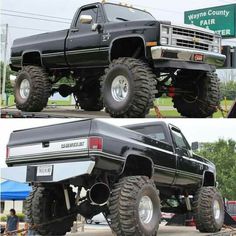 two pictures of a black truck with big wheels and huge tires on it's flatbed