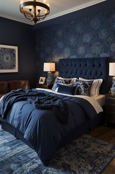 a bedroom with blue and white decor in it